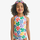 Kids swim tank in rainbow blooms