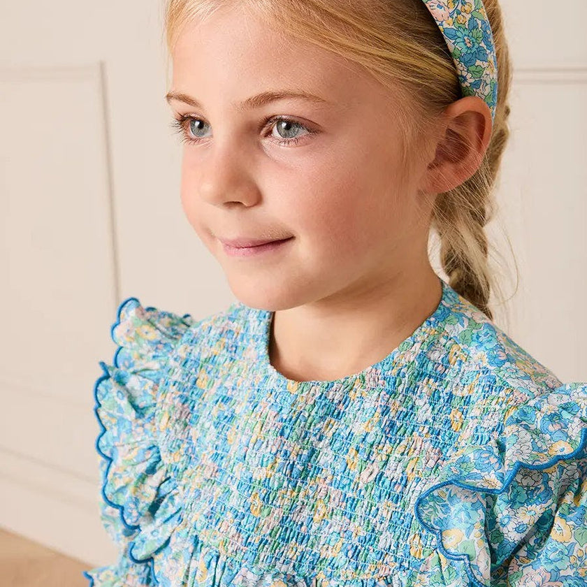 Leontyne Floral Scalloped Smocked Detail Short Sleeve Blouse in Blue Made with Liberty Fabric (2- 10yrs)