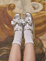 Nicky Hilton x La Coqueta Silver Tessa Leather Girl T-Bar Shoes