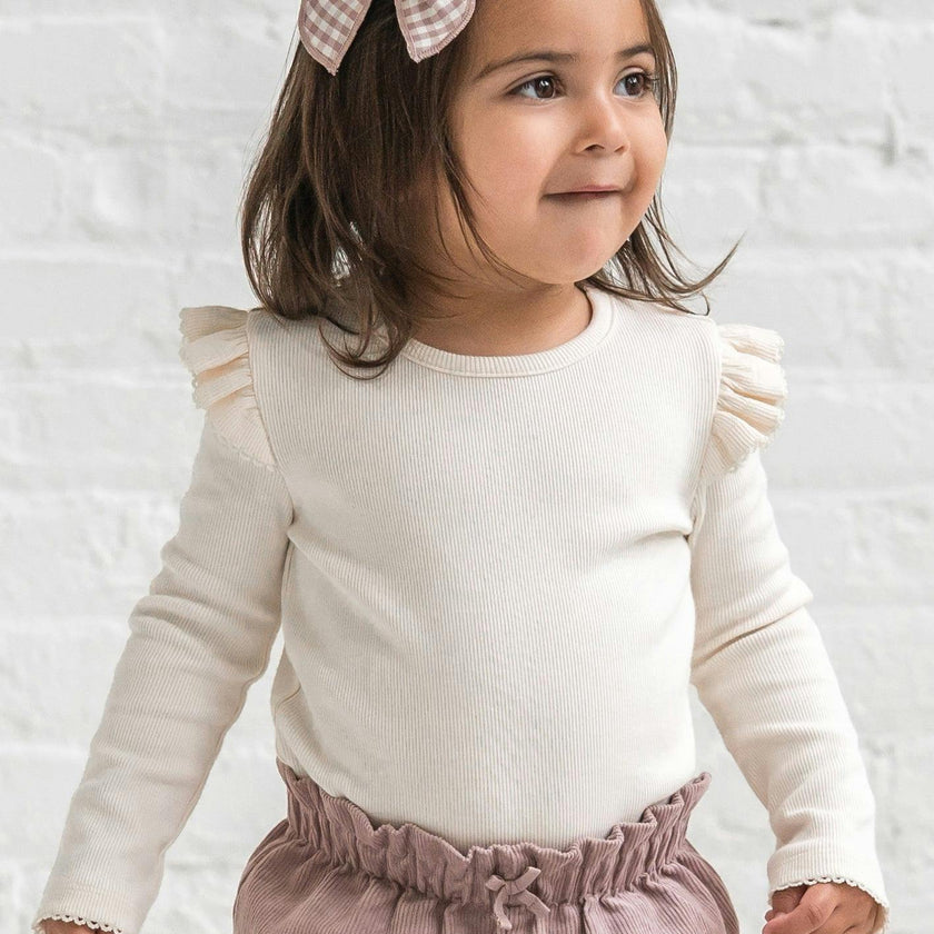KENDI Rina Ribbed Ruffle Long Sleeve Top