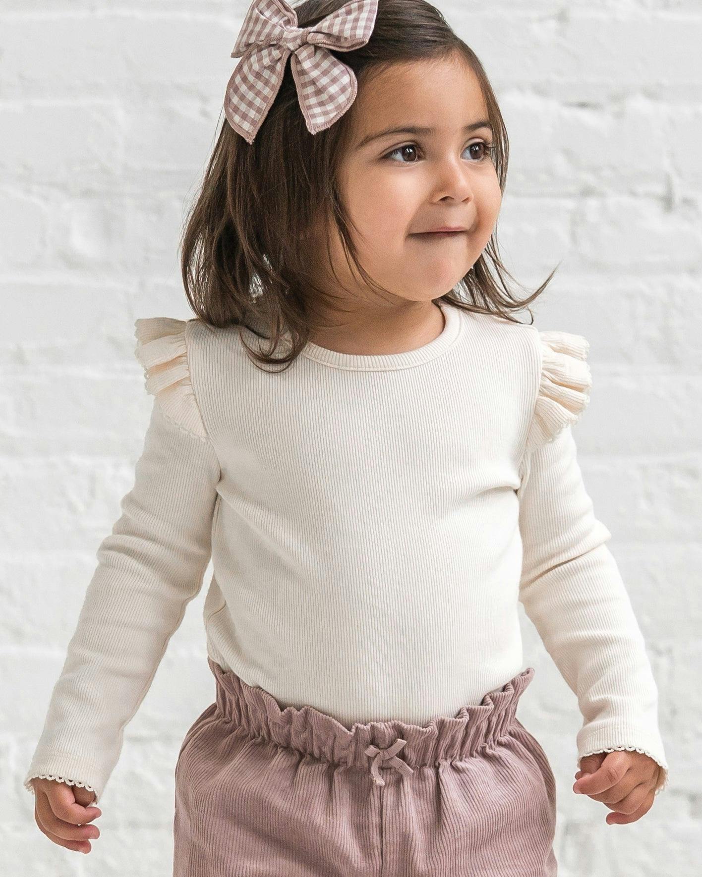 KENDI Rina Ribbed Ruffle Long Sleeve Top