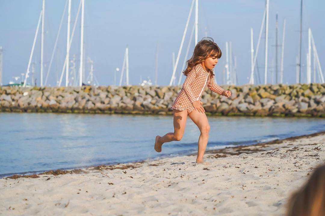 Long Sleeve Rashguard Ruffle Swimsuit | Sienna Gingham