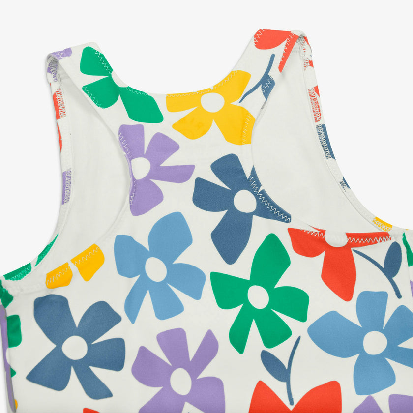 Kids swim tank in rainbow blooms