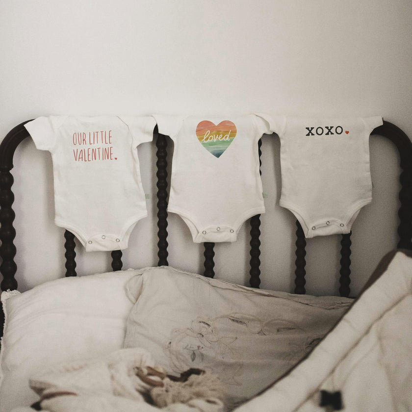 graphic bodysuit | loved rainbow heart