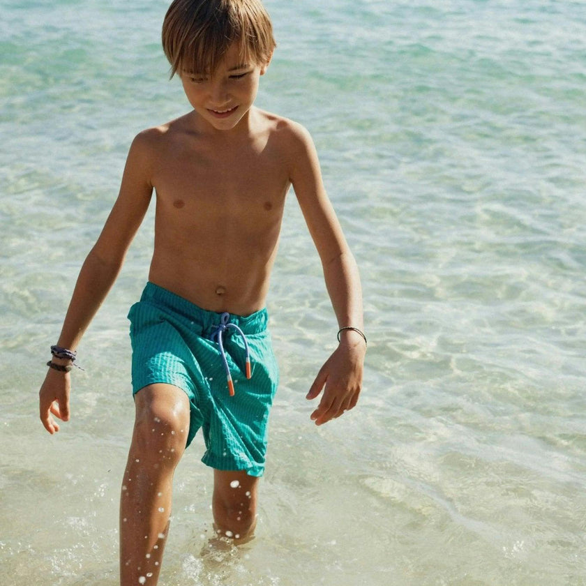 Boys' swim shorts, green stripes | FIJI